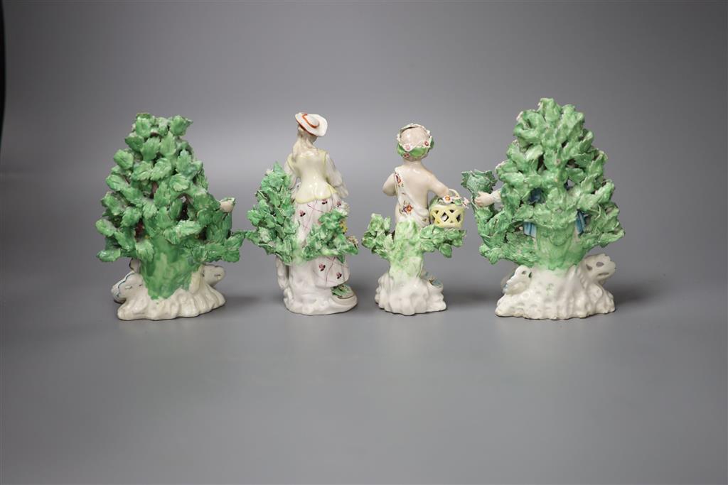 A pair of late 18th century Derby bocage figures, 16cm high, similar shepherdess and putti